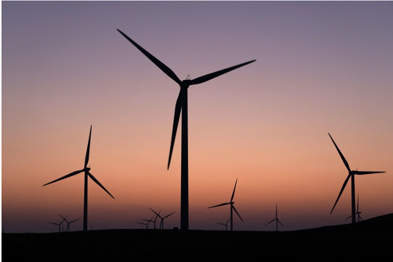 Wind turbines at sunset